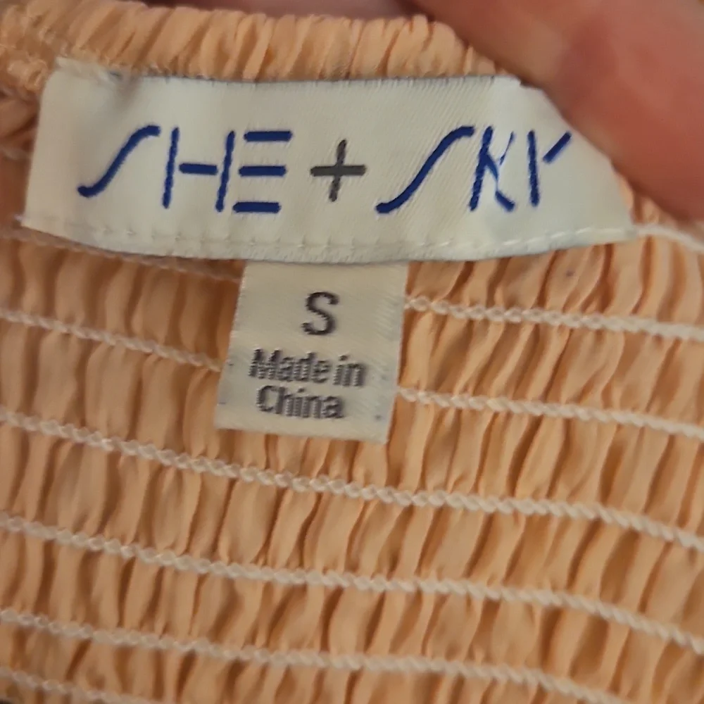 SHE & SKY Peach Off-Shoulder Ruched Peplum Ruffle Smocked Cropped Top - Picture 7 of 8